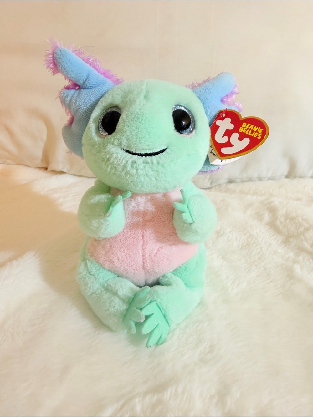 Ty beanie belies a axolotl plush        Buy one get this one 50 % off